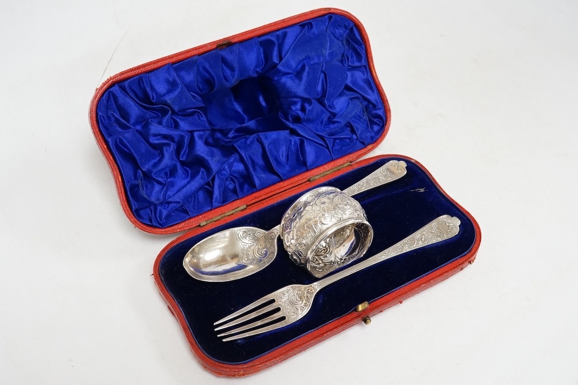 Three assorted silver christening sets including spoon, fork and napkin ring by William Hutton & Sons, London, 1896, one other set with steel knife, two cased sets of silver coffee spoons and a cased set of six Japanese
